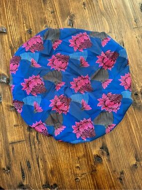 Vivid Blue Round Satin Lined Bonnet with Hot Pink Floral Motif